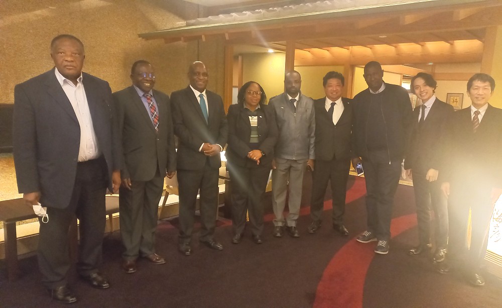 H.E. Ambassador Baraka Luvanda in a group photo with University of Dodoma Delegation and Tokushukai Medical Group representatives