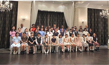 Ambassador Luvanda in a group photo with participants.