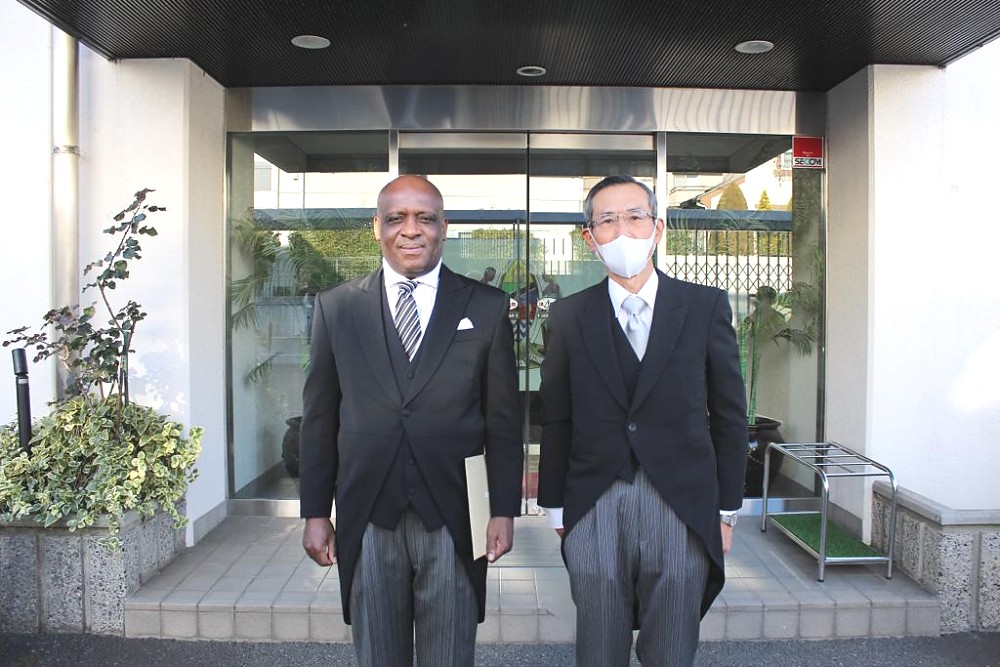 H.E. Ambassador Baraka Luvanda in a photo with the Master of Ceremonies at Imperial Palace, Mr. Kazunori Kawada