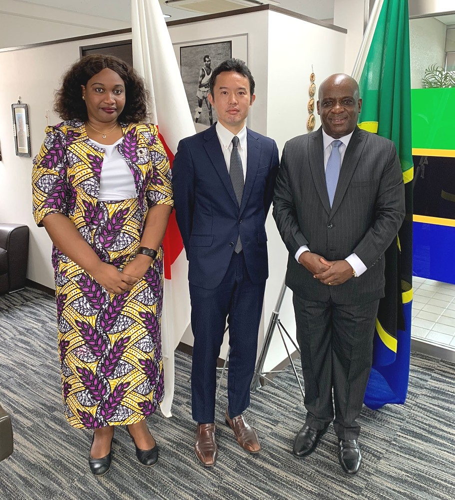 H.E. Ambassador H. Luvanda in a picture with Mr. Asano Seizaburo and the Officer at the Embassy