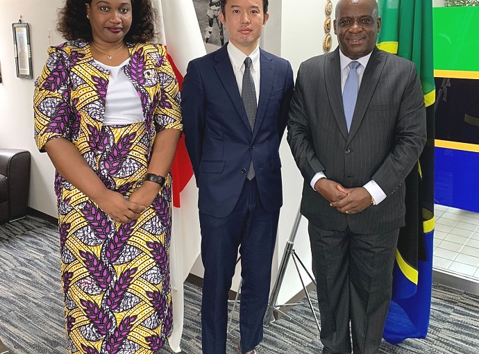 H.E. Ambassador H. Luvanda in a picture with Mr. Asano Seizaburo and the Officer at the Embassy