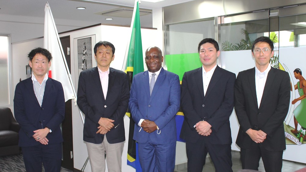 H.E. Amb. Baraka H. Luvanda in a group photo with Mr. Nezuka Takeshi and other representatives from Japan Firefighters Association