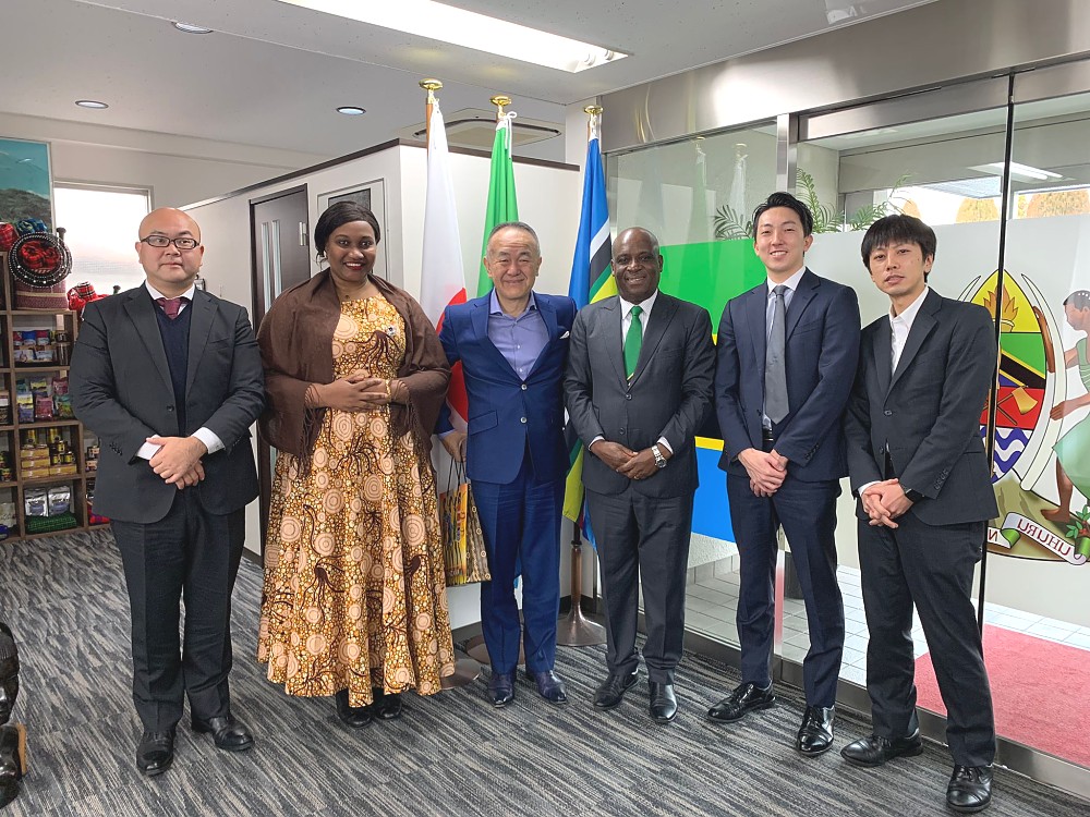 H.E. Ambassador Baraka Luvanda in a group photo with Mr. Susumu Tsubaki, Managing Director and CEO of Asia Africa Investment and Consulting (AAIC), a holding company of Tanzania and Japan (TANJA) Co. Ltd, at the Chancery.