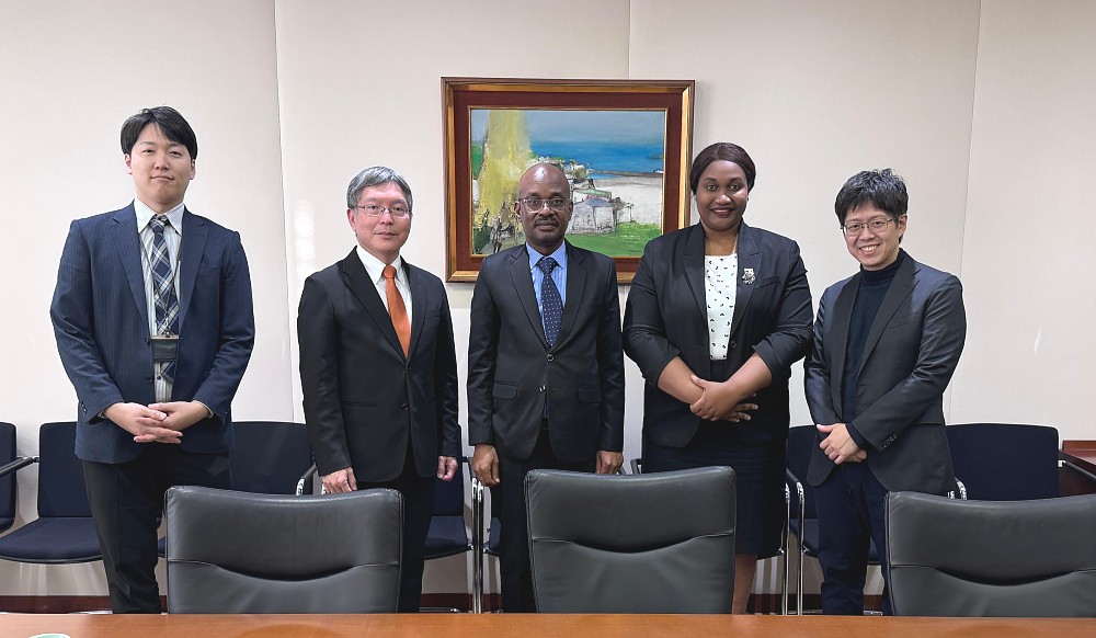 H.E. Ambassador Anderson Mutatembwa in a group photo with Mr. Tatsushi Amano, Senior Executive Managing Officer and Global Head of the Energy and Natural Resources Finance Group at JBIC, with their senior experts.