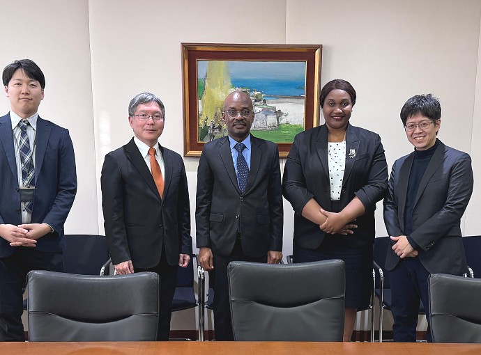 H.E. Ambassador Anderson Mutatembwa in a group photo with Mr. Tatsushi Amano, Senior Executive Managing Officer and Global Head of the Energy and Natural Resources Finance Group at JBIC, with their senior experts.