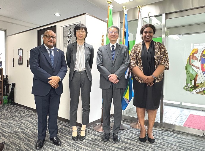 The Embassy staff, Ms. Edna Dioniz Chuku, Counsellor of Economic Affairs, and Mr. Hosea Chikolongo, Political and Cultural Attaché, in a group photo with representatives from the Ministry of Foreign Affairs of Japan