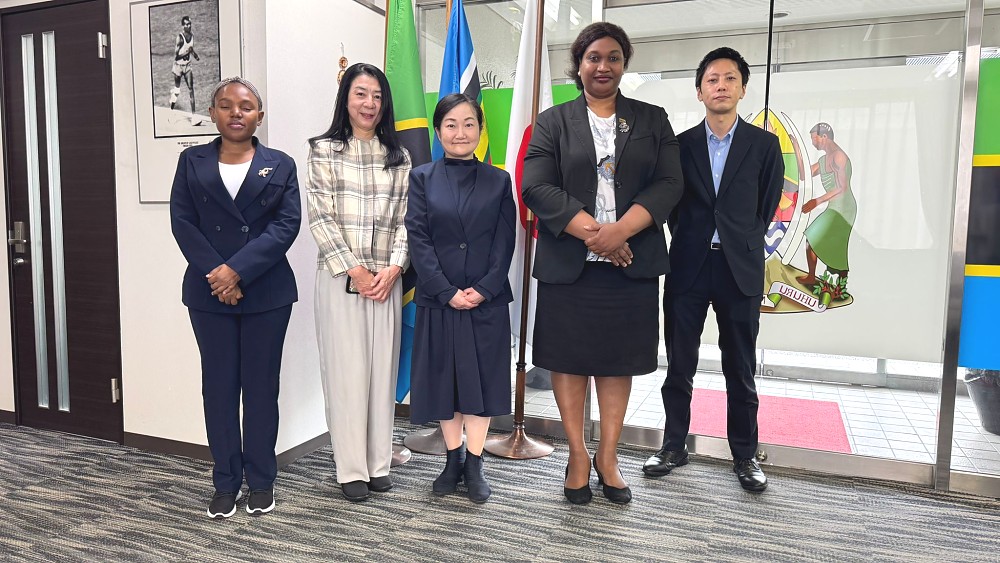 The Embassy staff in a group photo with representatives of AMDA International Medical Information Center.